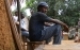 Sierra-Leone-2010-(267)-Drill-casings-and-villager-Yuabu